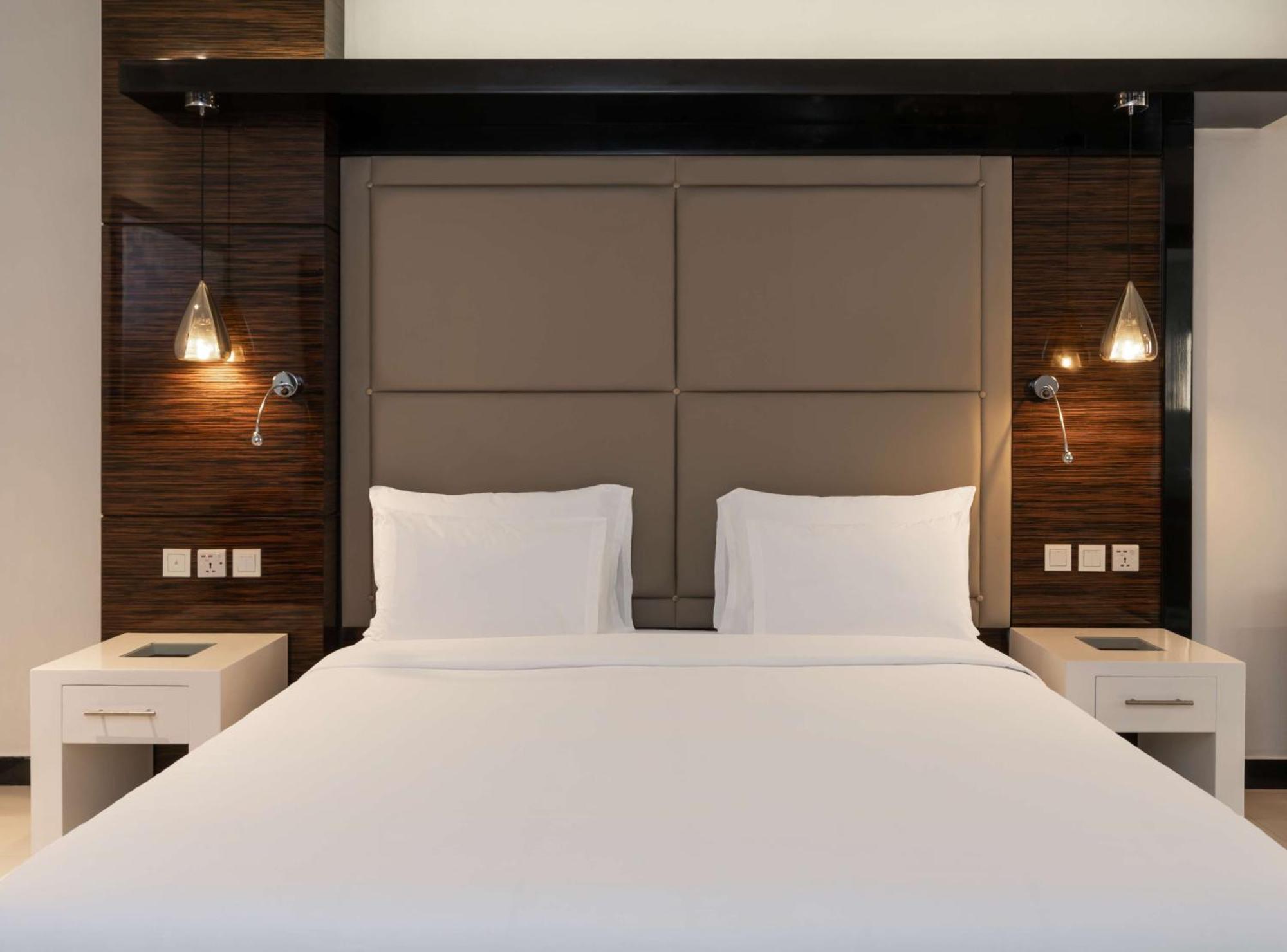 Radisson Blu Hotel Lusaka Exterior foto A bedroom at the hotel
